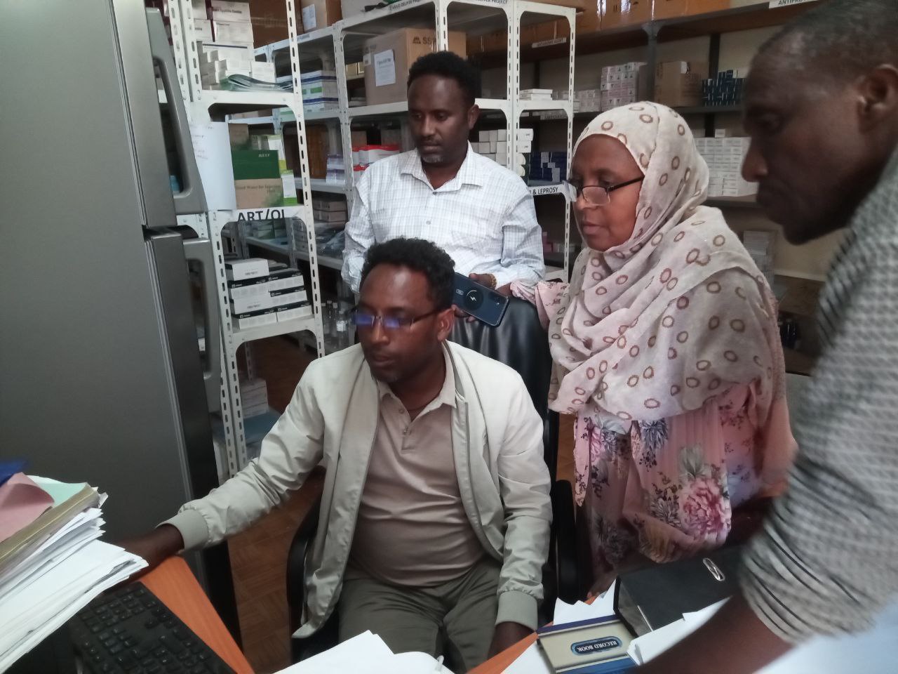 Mentorship on APTS report generation at Gondar Health Center.